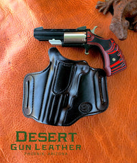 Left hand draw cross draw holster for a black widow