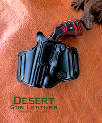 Left hand draw cross draw holster for a black widow