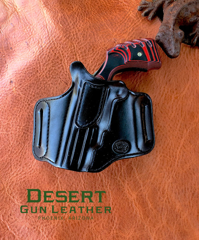 Left hand draw cross draw holster for a black widow
