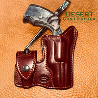 NAA Recluse pocket holster, mahogany leather with burnt orange thread stitching, optional speed loader snap pouch