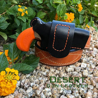Right Hand Driving Holster for a NAA Bug Out, black leather with safety orange stitching